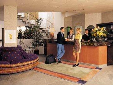 Le Petit Cervin Hotel Zermatt Exterior photo A concierge desk at a hotel